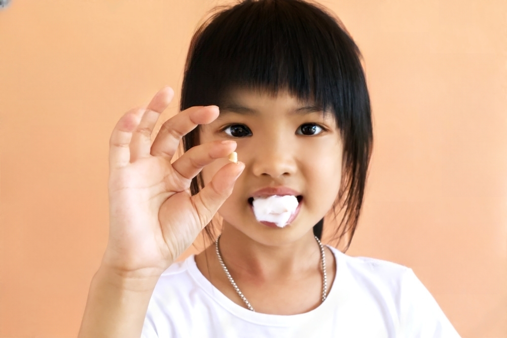 The risks and benefits of treating cavities in baby teeth